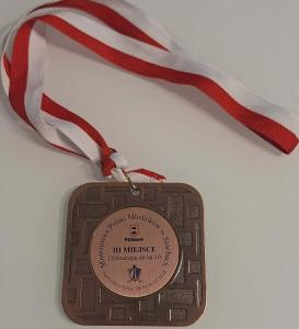 Brazowy medal Moniki.jpg